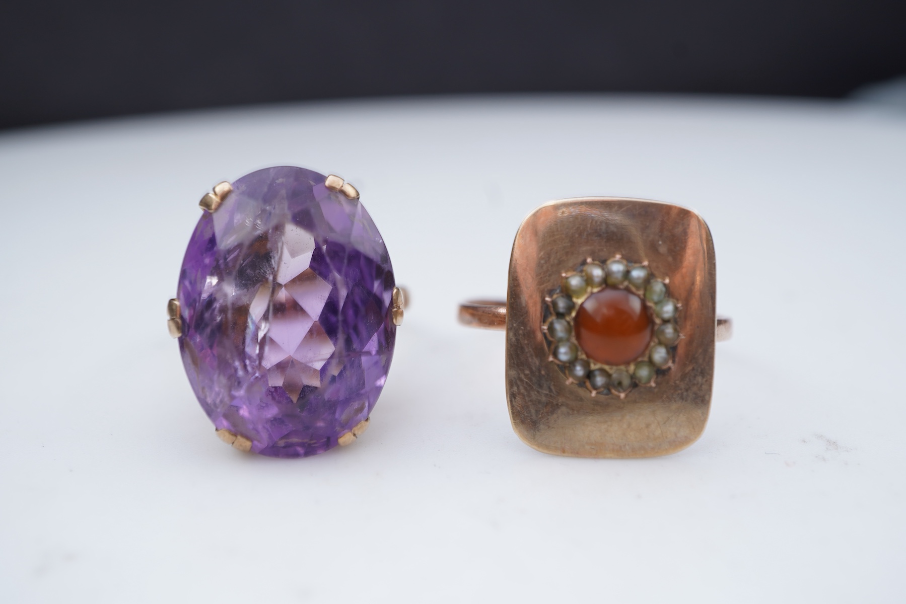 Three rings and a brooch